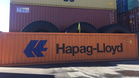 large-sized tires in a container